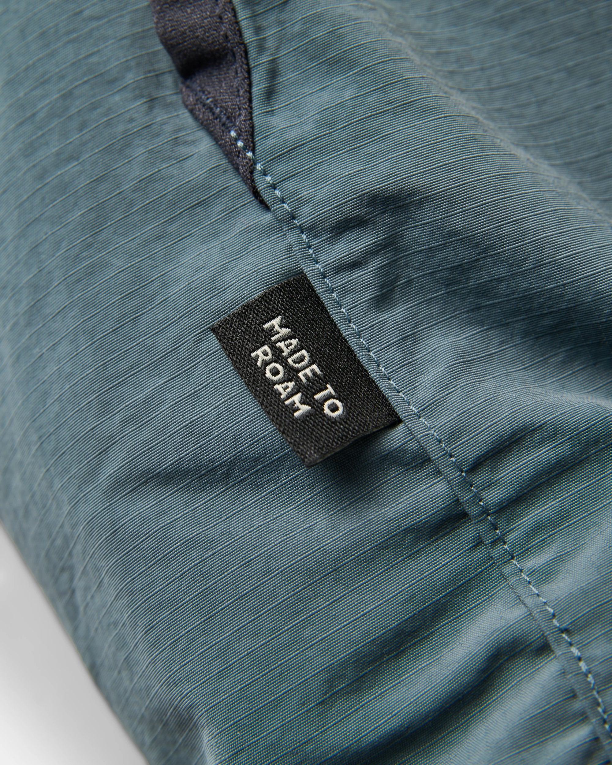 Set Off Reversible Polartec Fleece Top - Warmes Beige/Marineblau – Bild 9